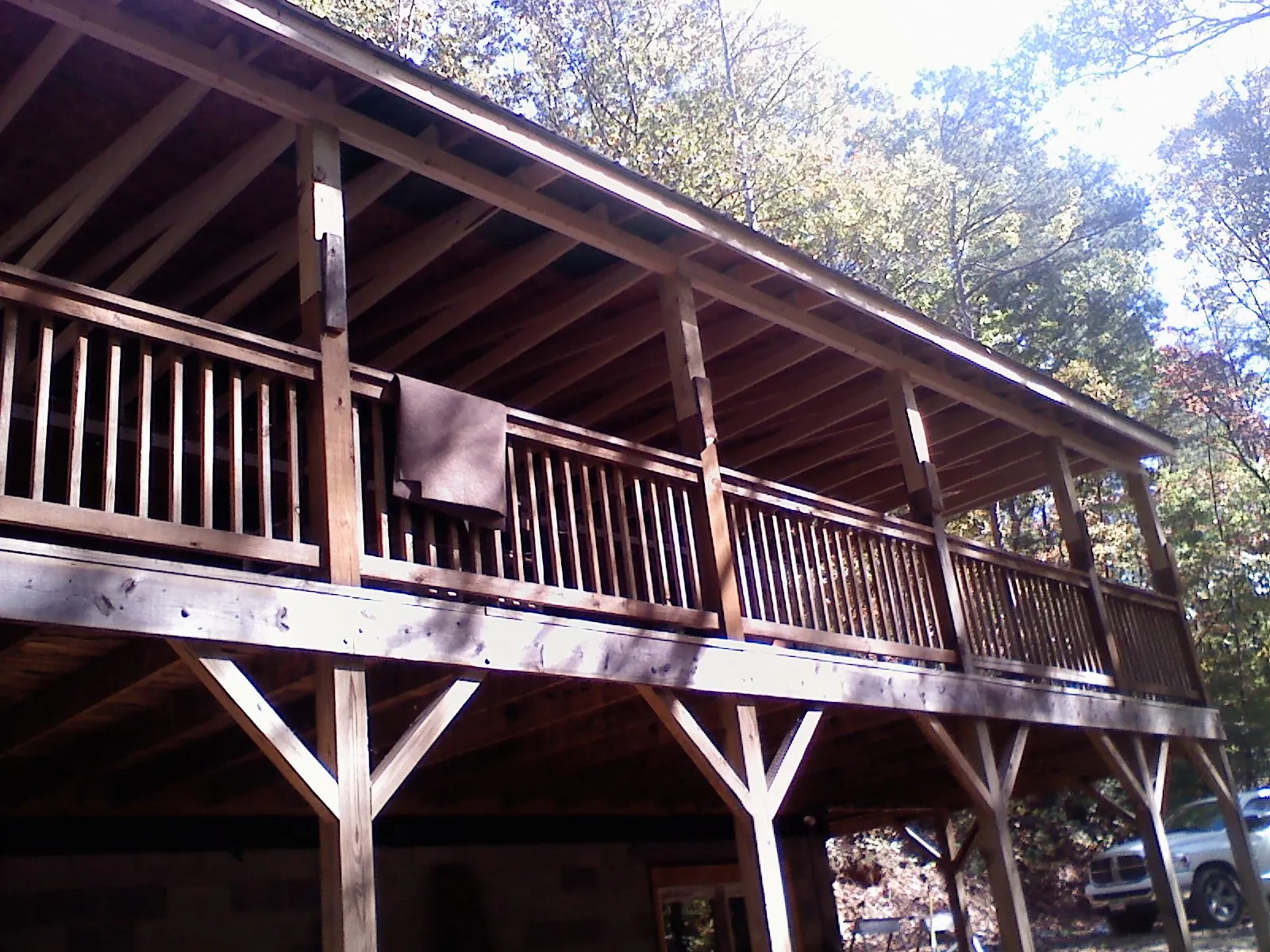 Timber framing under a new elevated porch and deck — Roof Leak Repair in Streamwood by Roofing Brothers